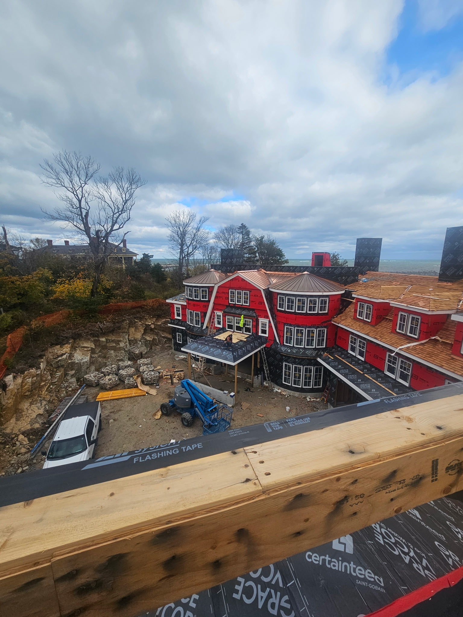 Roofing project with clean shingle replacement and ridge detail