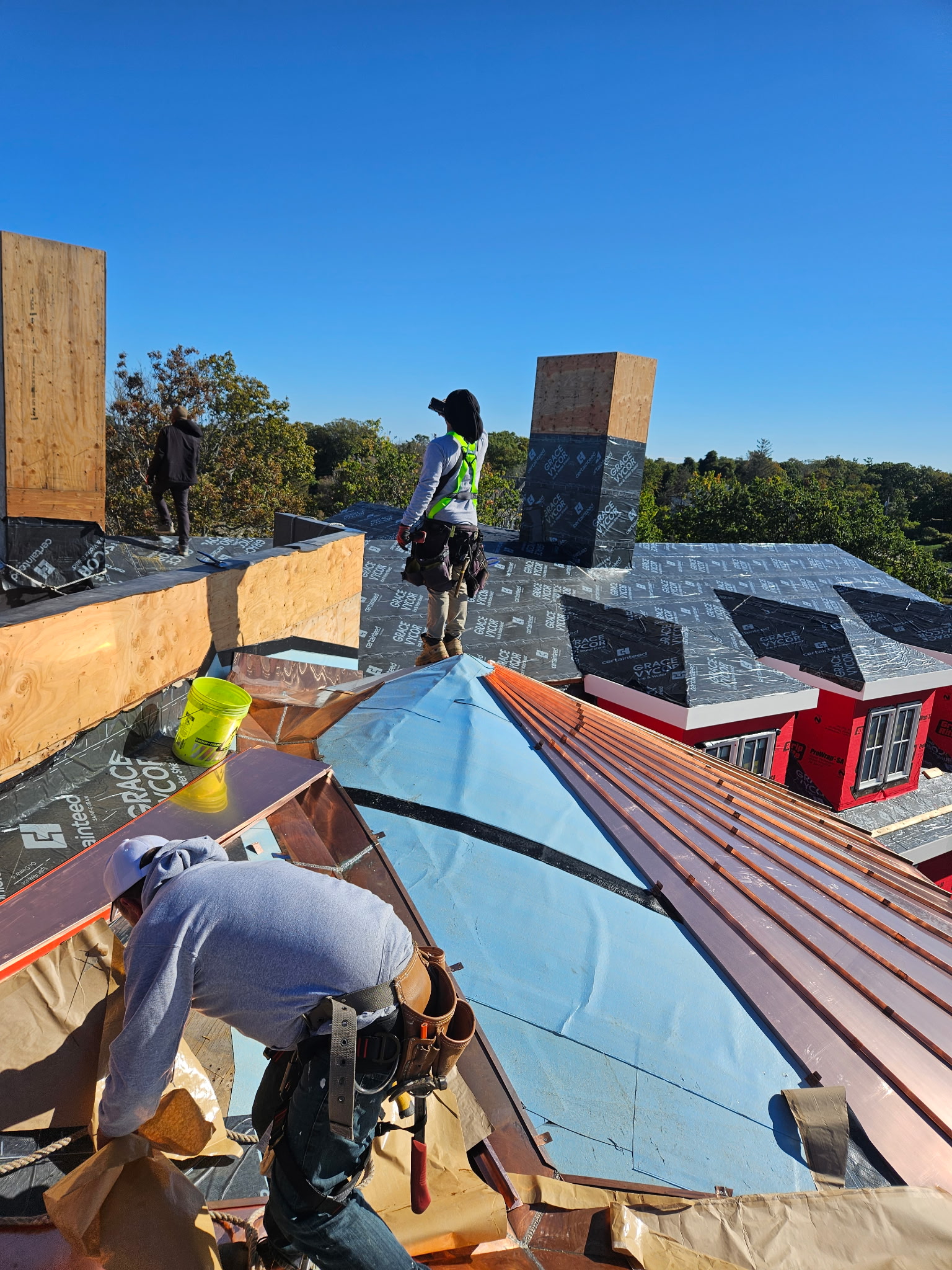 Final roofing inspection showing clean finish and new shingles